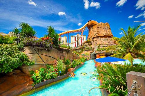 Piscina en o cerca de Spazzio diRoma RM Hospedagem com Acesso Acqua Park/Splash