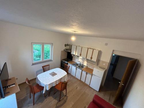 Televízia a/alebo spoločenská miestnosť v ubytovaní Apartman Caminito