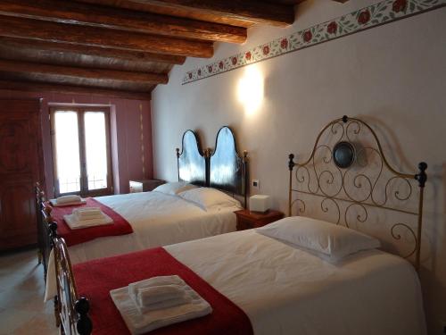 Säng eller sängar i ett rum på Le Camere Della Bice