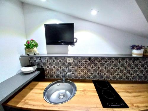 Una cocina o zona de cocina en Apartments Lido