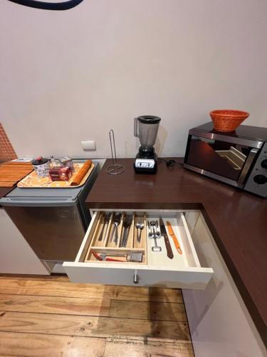 Η κουζίνα ή μικρή κουζίνα στο AMSTELHUIS APARTMENTS PROVIDENCIA Santiago Baquedano