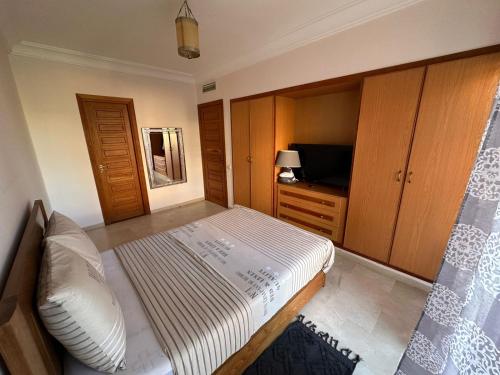 Katil atau katil-katil dalam bilik di Résidence Dar Damana Palmeraie Marrakech