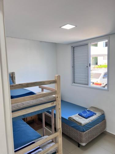 Krevet ili kreveti na sprat u jedinici u okviru objekta Santa Rosa hospedagem