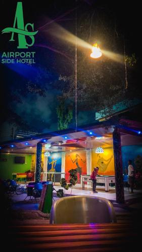 a stage with a sign that says airport side hotel at Airport Side Hotel in Accra