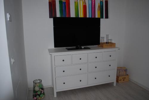 TV a/nebo společenská místnost v ubytování B&B Cuor Di Lavanda