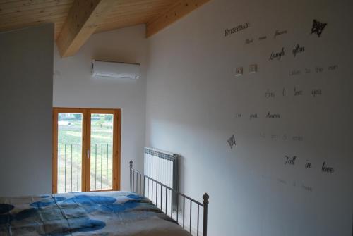 Postel nebo postele na pokoji v ubytování B&B Cuor Di Lavanda