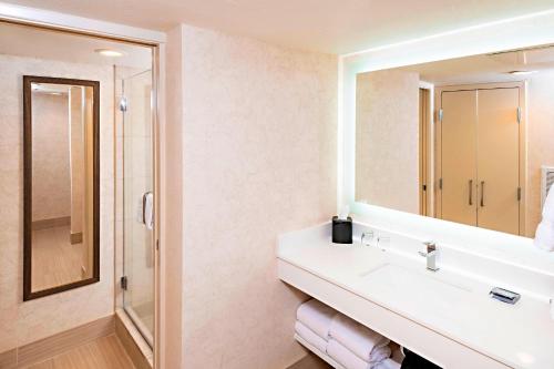 a bathroom with a sink and a mirror at Phoenix Marriott Resort Tempe at The Buttes in Tempe