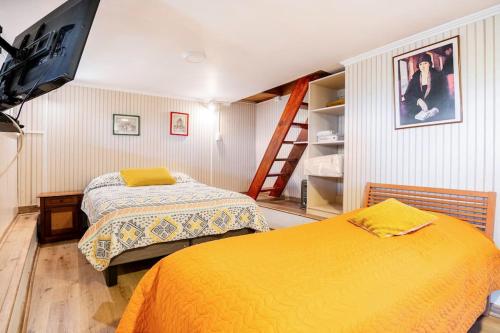 Postel nebo postele na pokoji v ubytování Suite privada en Viña del Mar, cerca de la Quinta Vergara