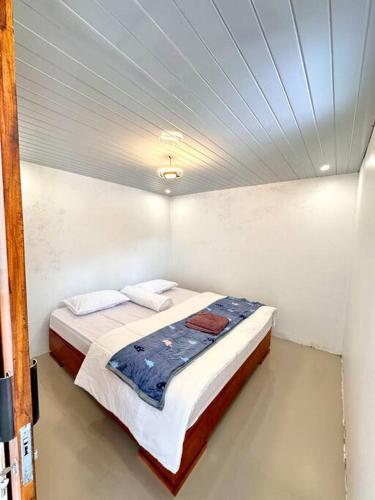 Cama o camas de una habitación en Go Dieng Cabin 4