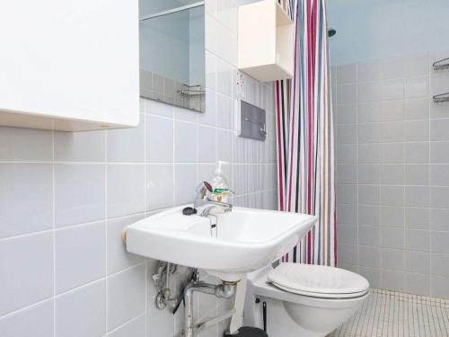 a bathroom with a sink and a toilet at Holiday home Lemvig XLIV in Lemvig