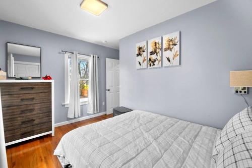 Ένα ή περισσότερα κρεβάτια σε δωμάτιο στο 3 Bedroom Apartment on Forestville Bristol