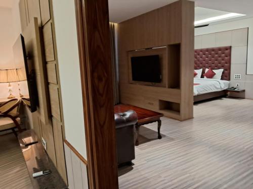 TV a/nebo společenská místnost v ubytování Hotel k11