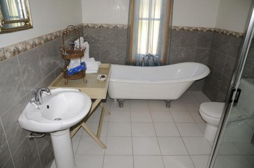 Et badeværelse på Riversdale Estate Cottages