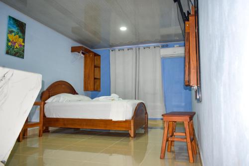 Ένα ή περισσότερα κρεβάτια σε δωμάτιο στο Cabinas Ecologicas Rio Brasil