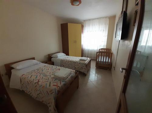 Ένα ή περισσότερα κρεβάτια σε δωμάτιο στο CUORE DEL SUD