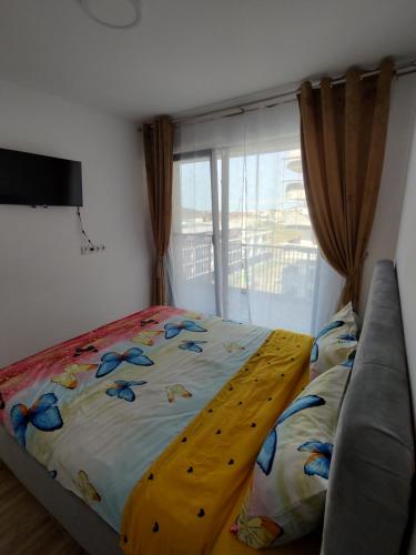 Postel nebo postele na pokoji v ubytování Apartament Cluj cu Terasa 10 minute Vivo Mall