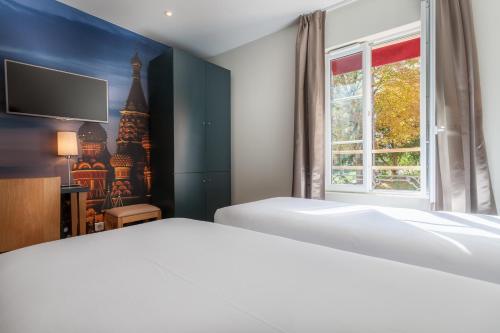 Кровать или кровати в номере Hotel Jenner