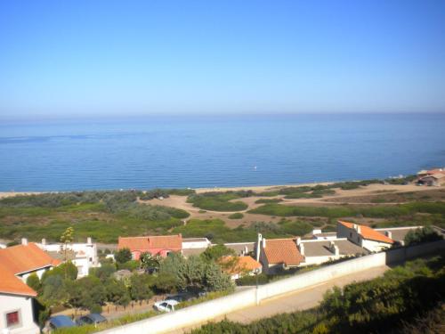 an aerial view of a town and the ocean at Casa vacanze con terrazza panoramica vista mare in Portu Maga