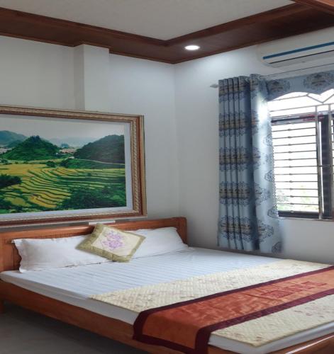 Ένα ή περισσότερα κρεβάτια σε δωμάτιο στο Thien An Guest House