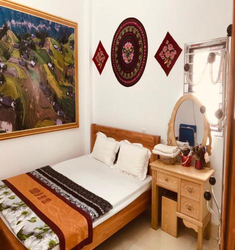 Postel nebo postele na pokoji v ubytování Yen Minh Hotel Thien An