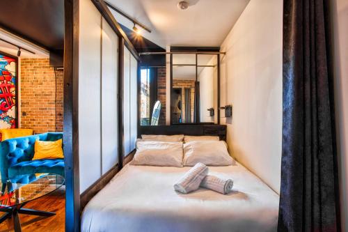 Posteľ alebo postele v izbe v ubytovaní Studio Bagatelle Deauville