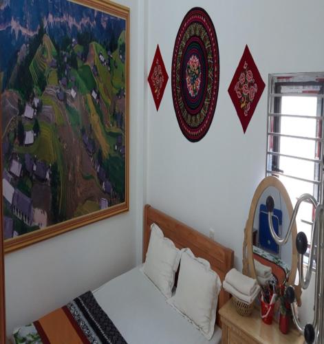 Ένα ή περισσότερα κρεβάτια σε δωμάτιο στο Thien An Guest House