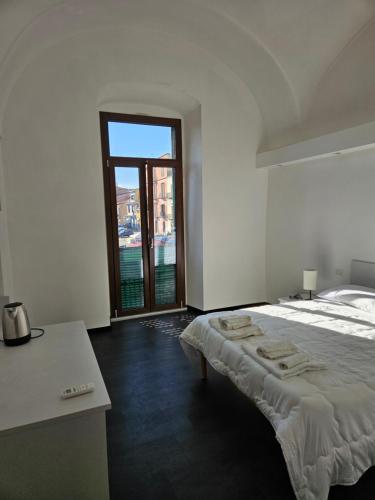 Katil atau katil-katil dalam bilik di La Dama del Castello