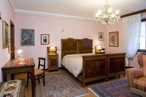 Ένα ή περισσότερα κρεβάτια σε δωμάτιο στο B&B Casa Mia