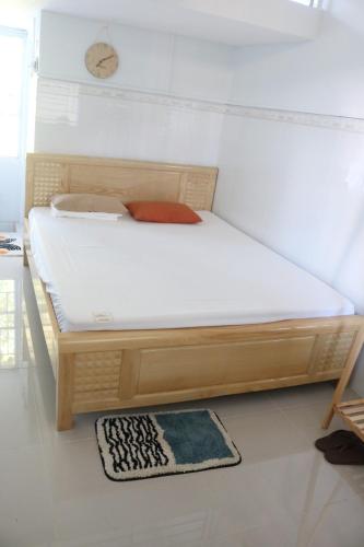 Ένα ή περισσότερα κρεβάτια σε δωμάτιο στο Tran Phu Riverside House