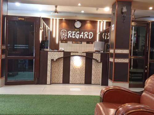 a lobby of a hotel with a reception desk at Hotel Regard in Varanasi