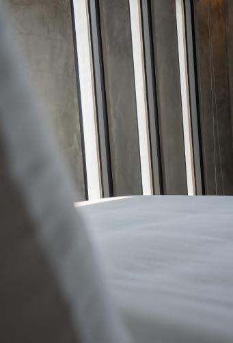 Postel nebo postele na pokoji v ubytování Serendipity House澎湖望安島