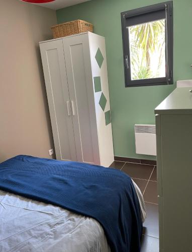 Postel nebo postele na pokoji v ubytování Le Studio de Vasconia