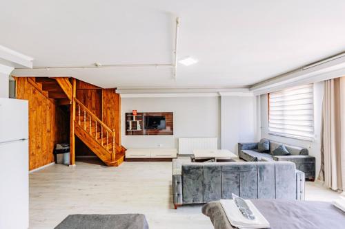 a living room with a couch and a table at Diamond Suites Residence in Istanbul