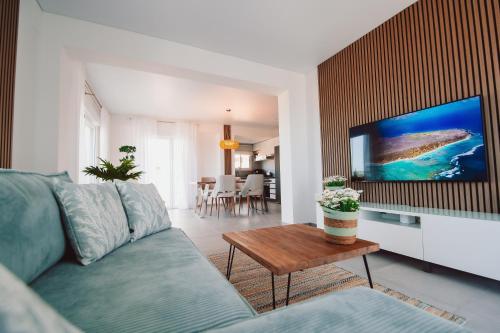 TV a/nebo společenská místnost v ubytování Apartamento Perla de Mar