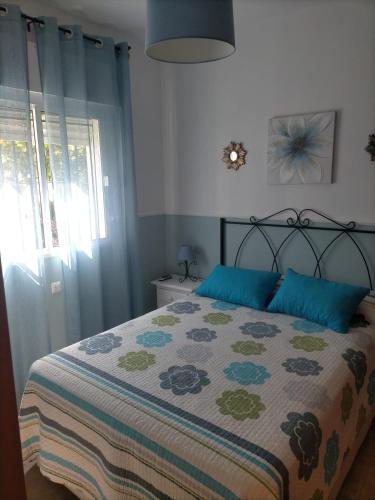 Ένα ή περισσότερα κρεβάτια σε δωμάτιο στο Villa Mesana