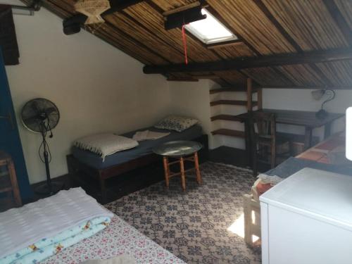 Postel nebo postele na pokoji v ubytování Ecer Pansiyon