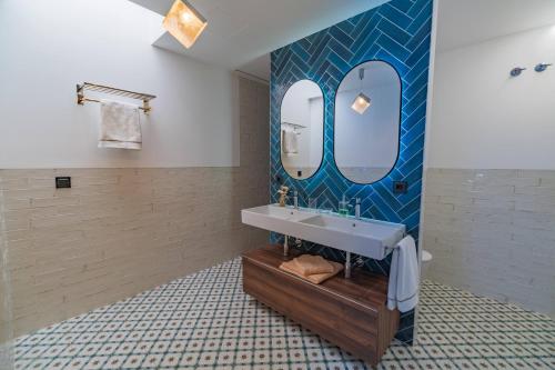 Een badkamer bij Villa Los Olivos