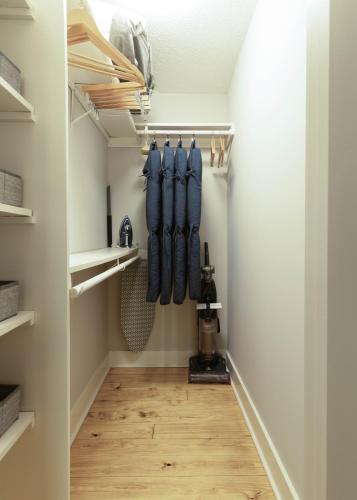 a walk in closet with blue baseball bats at Hemlock Hideaway in Ellijay