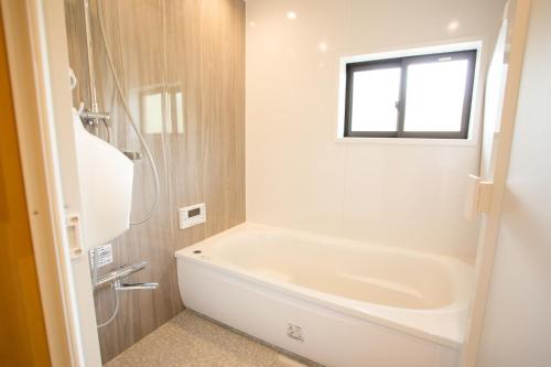 Koupelna v ubytování 一棟貸し宿 Kanata Riverview House