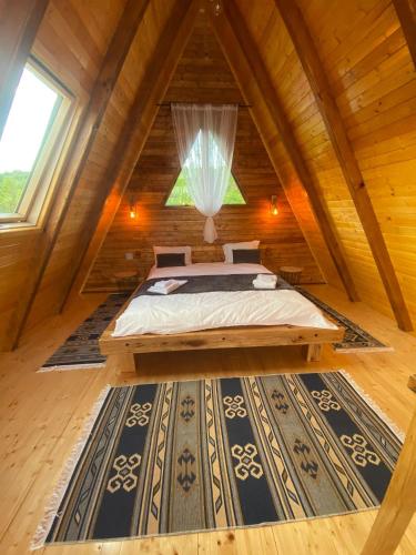 Katil atau katil-katil dalam bilik di Wood & Bricks Chalet