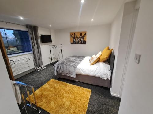 En eller flere senge i et værelse på Nice cottage in the countryside