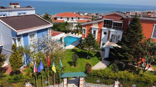 an aerial view of a city with houses at İstanbul Airport Treekos Suite Hotel in Karaburun