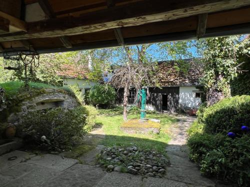 a view of a garden from the inside of a house at Forsthartl 7 Landhausurlaub in Steinbach