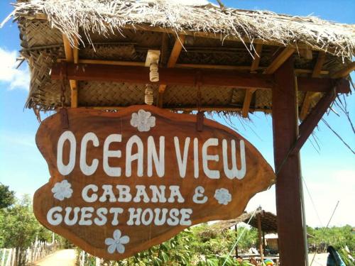 a sign for an ocean view cahaba guest house at Ocean View (Cabana & Guest House) in Arugam Bay
