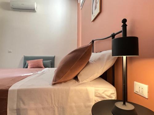 Ένα ή περισσότερα κρεβάτια σε δωμάτιο στο M'AMA apartment 1