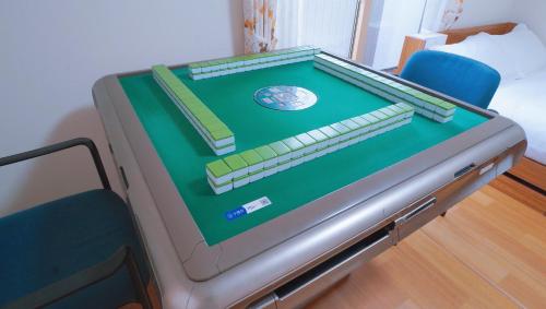 a cake that looks like a computer desk at 東賀旅館 in Tokyo
