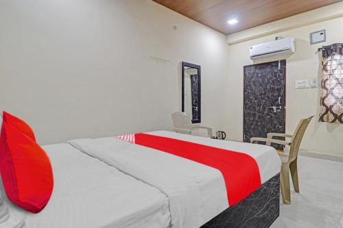 Postelja oz. postelje v sobi nastanitve OYO Flagship Rks Residency