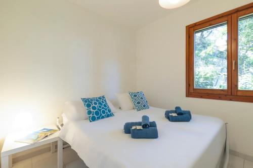 Una cama o camas en una habitación de Casa Marilò - wifi e vista mare