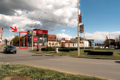 a car driving down a road in a city at Apartman Agata,Osijek, self check-in in Osijek