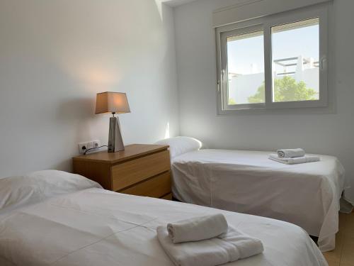 Postel nebo postele na pokoji v ubytování Condado de Alhama, JARDIN 10 SV92